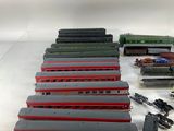 a lot of toy trains that are on the table