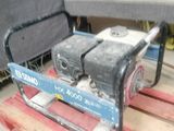 a small engine on a pallet in a warehouse