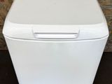 an image of a white washer and dryer in a living room