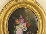a picture of a picture of a vase of flowers on the wall