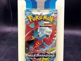 a close up of a box of pokemon trading cards on a table