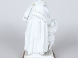 an image of a statue of a woman holding a child
