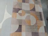a picture of a rug with a design on it
