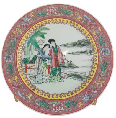 a plate with a picture of two people on it