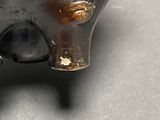 a small metal object that looks like an elephant