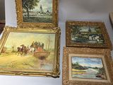 four paintings on a table with a white table cloth