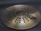 a close up of a metal plate with holes on it