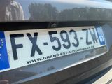 a close up of a license plate on the back of a car