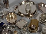 a lot of silver items that are on a table