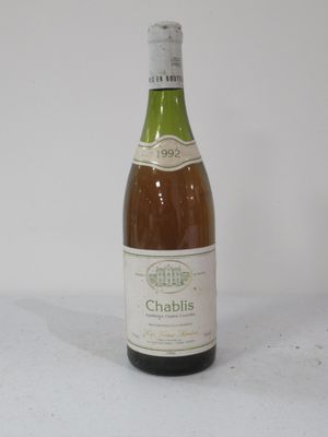 a bottle of wine that is sitting on a table