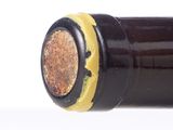 a close up of a bottle of wine with a cork stopper