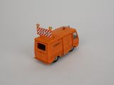 an orange toy truck with a construction sign on top of it