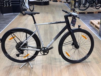 a bike that is sitting on the floor in a store