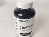 a bottle of vitamin supplement sitting on a table