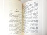 an open book that is sitting on a table