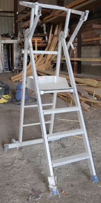 a ladder that is sitting in the middle of a building