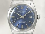 an image of a rolex watch with a blue dial