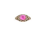 a gold ring with a pink stone surrounded by diamonds