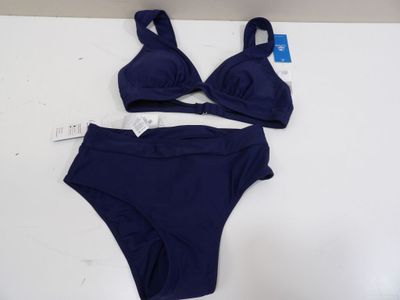 a bathing suit and panties on a white table