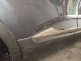 a close up of a car ' s door handle and door handle