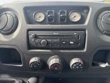 a close up of a car dashboard with various controls