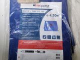 a close up of a bag of blue tarp on a table