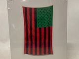 a white box with a red and black flag on it