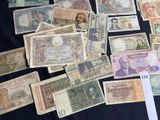 many different types of currency on the table