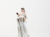 figurine of a woman holding a baby in her arms