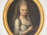 un portrait ovale représentant une femme vêtue d'une robe blanche et d'un voile