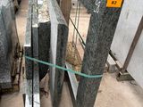 many different types of granite slabs in a store