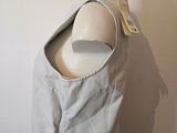 a mannequin head with a white shirt on it