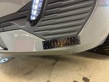 a close up of a car with a number plate on it