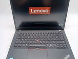lenovo laptop with the lenovo logo on the screen