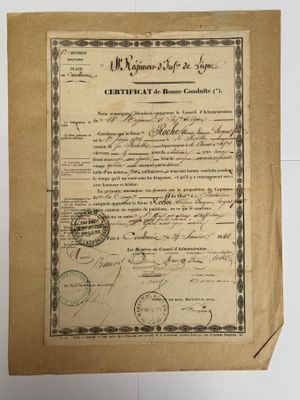 un vieux document portant un cachet, posé sur une table