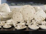 a table with a lot of plates and bowls on it