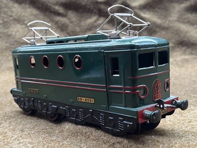 a toy train that is sitting on the ground