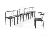 six chairs that are lined up in a row