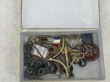a box with a bunch of keys in it on the floor
