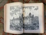 an open book with a drawing of a building on it