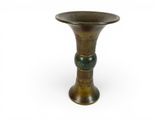 an image of a bronze vase on a white background
