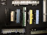 a lot of toy trains that are on the table