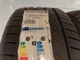 a close up of a tire with a sticker on it