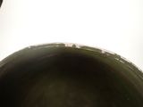 a close up view of a pot with a handle