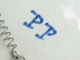 a white plate with a blue and white design on it