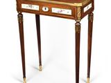 an image of a small table with a drawer on top of it