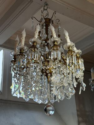 a chandelier hanging from the ceiling in a room