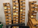 several boxes are stacked on top of each other in a room