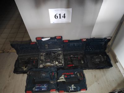 a lot of tools that are sitting on the floor