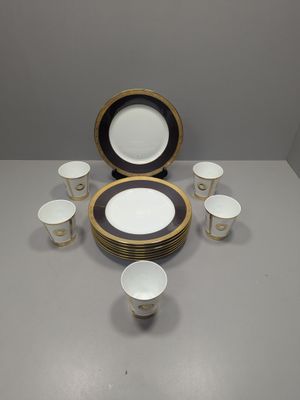 a lot of cups and a plate on the table
